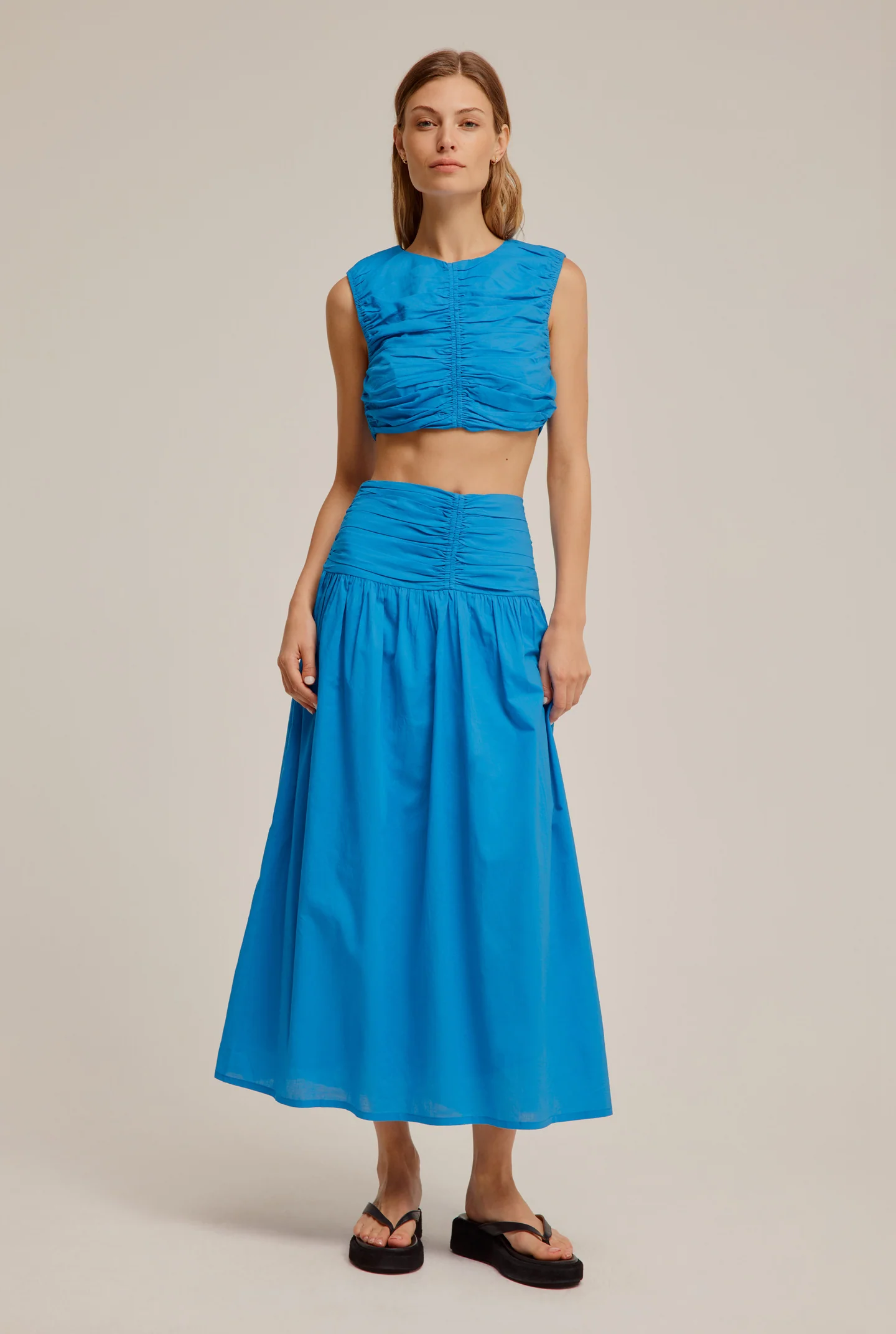 Sleeveless, blue maxi set by Venroy for hire.