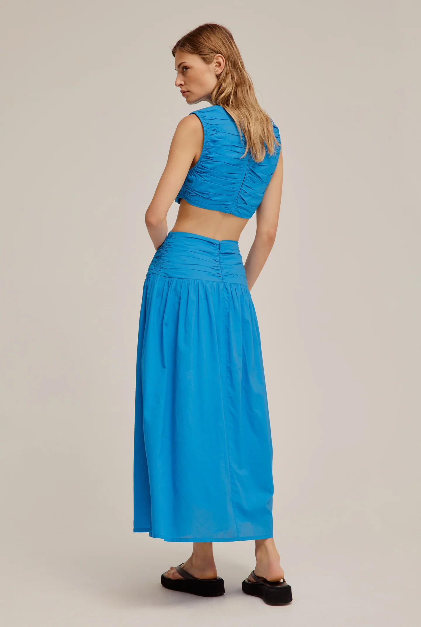 Sleeveless, blue maxi set by Venroy for hire.