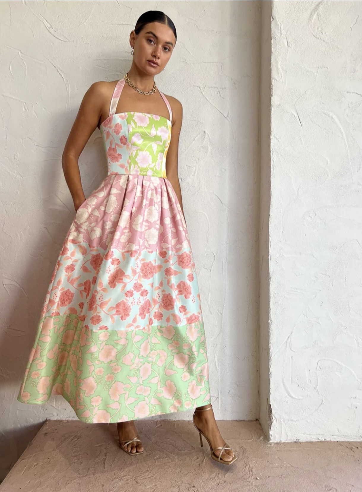 Leo Lin Anna Halterneck Maxi Dress for hire. A pastel pink floral halter maxi sundress.