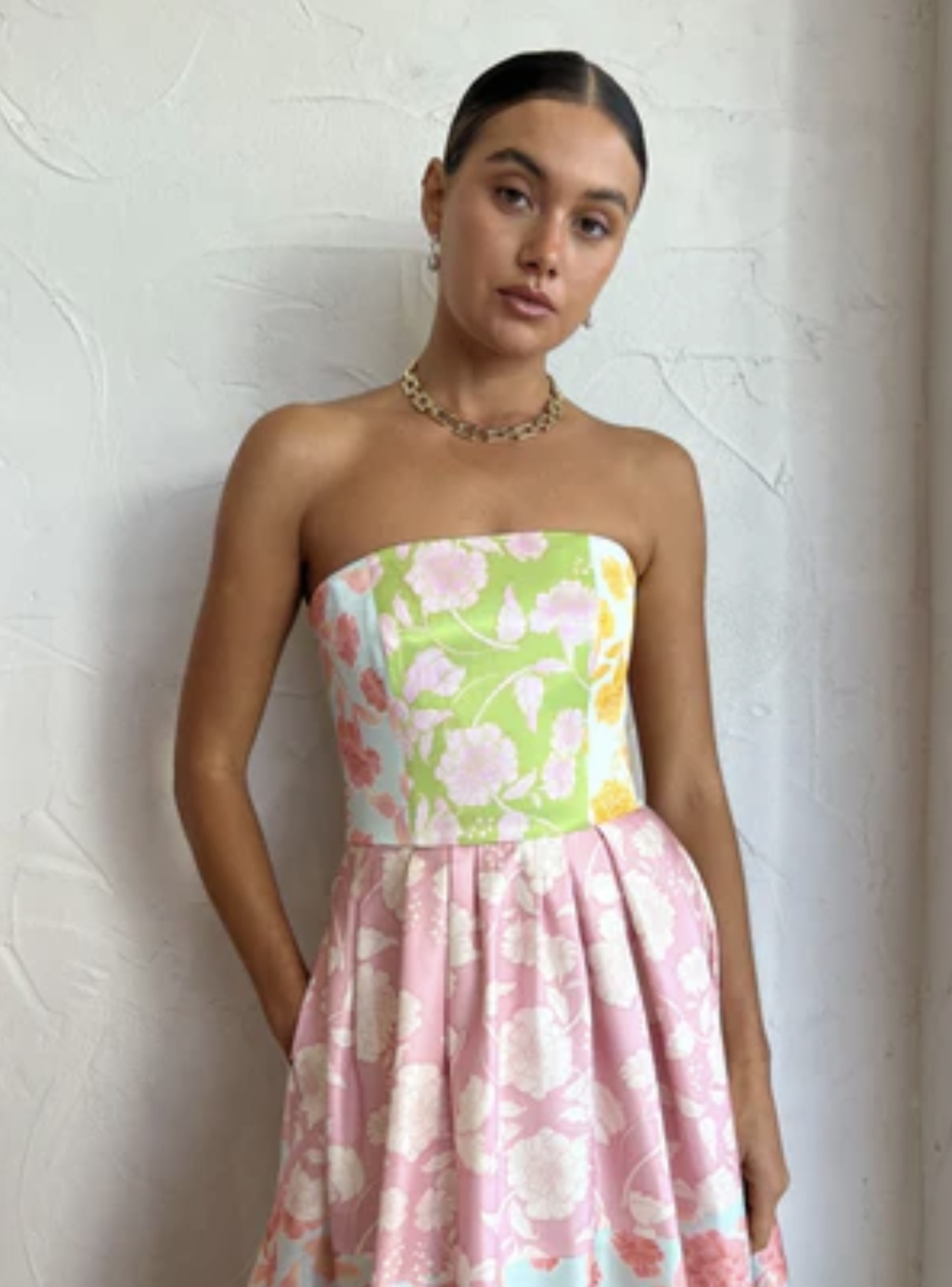 Leo Lin Anna Halterneck Maxi Dress for hire. A pastel pink floral halter maxi sundress.