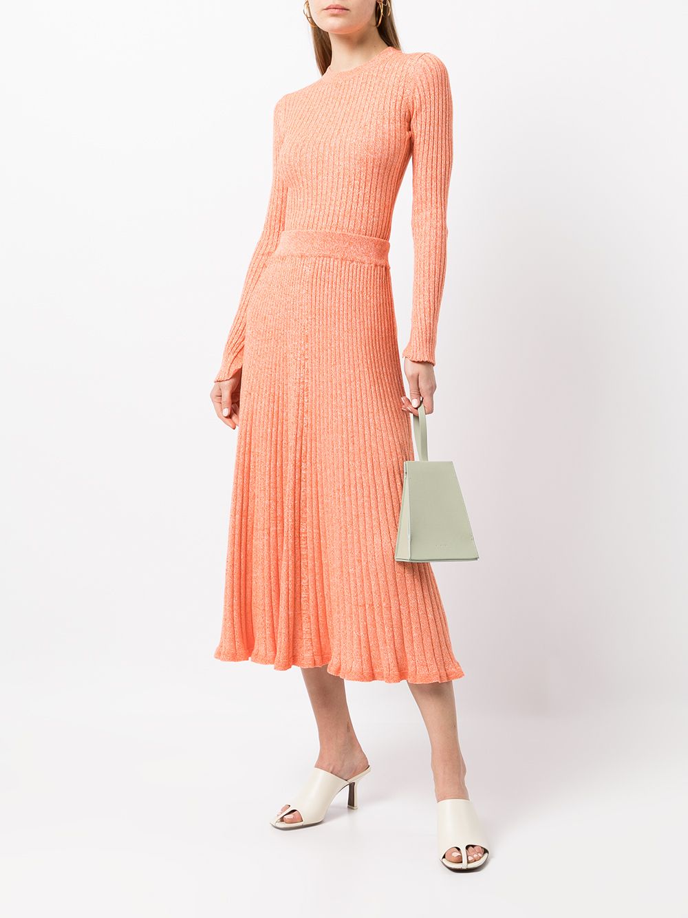 Alemais Elesha Top and Felicia Skirt. Orange ribbed knit set for rent.