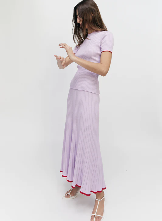 The Anna Quan Bebe Top and Felicia Skirt. Purple ribbed knit midi set for rent.