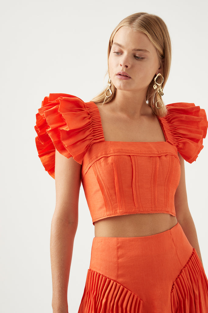 Aje Imagination Frill Sleeve Top. Orange crop top with ruffle sleeves for rent.